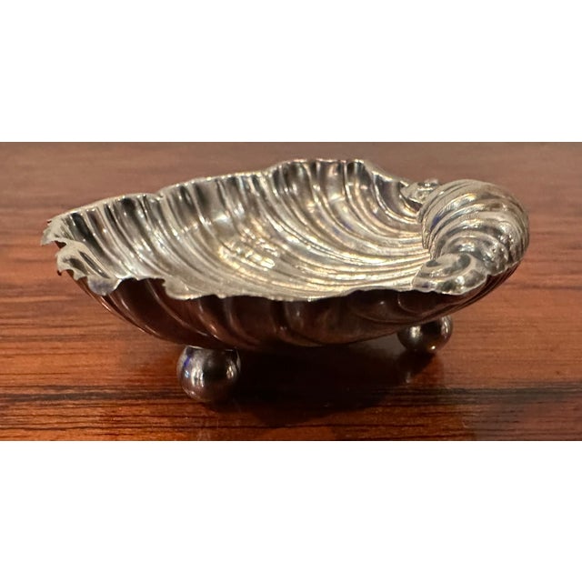 This delightful late Victorian petite (2 inch diameter) sterling silver bowl was crafted by the prestigious British...