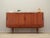 The highboard was made in the 1960s, designed by Danish design icon Børge Seindal. The structure is covered with teak...