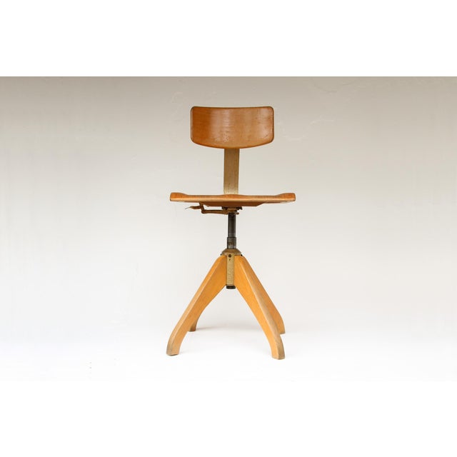 Industrial workshop chair, made in Germany in the 1940s/50s. Sturdy chair made of tubular steel and beechwood. The seat is...