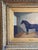 A charming 19th century equestrian portrait depicting a dark bay horse identified as “Wildfire,” standing within the quiet...