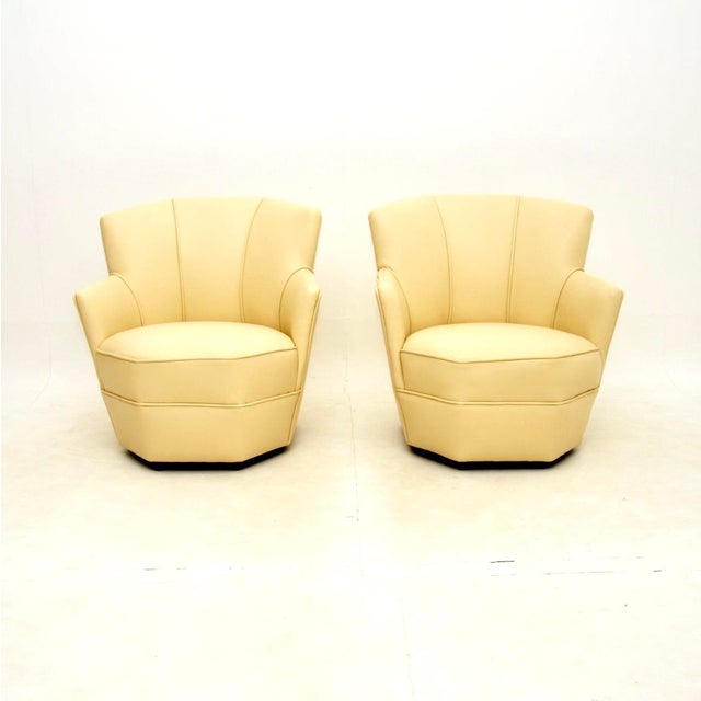 A stunning pair of leather Art Deco armchairs, made in England and dating from the 1930’s. They are of amazing quality and...