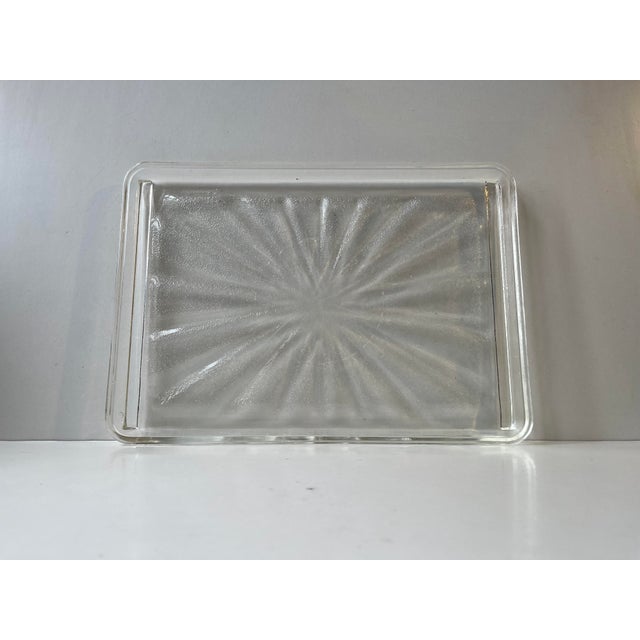 Large decorative tray in cast optical glass. Starbust or sunburst motif. Unknown maker circa 1970-90. Measurements:...