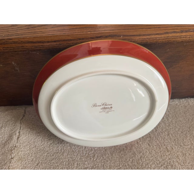 Mikasa bone China oval shaped serving bowl with Mikasa Egyptian Terracotta pattern. It features a white center, a...