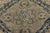 An early 20th century Persian Tabriz carpet, the three sand-colored linked medallions containing stellar medallions and...