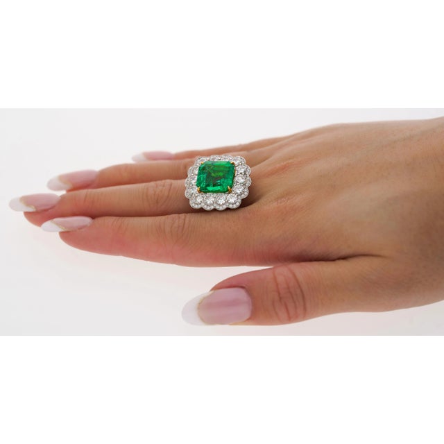 GRS Certified 8.04 carat octagonal emerald cut minor-moderate oil Colombian natural emerald & diamond halo ring. Details:...