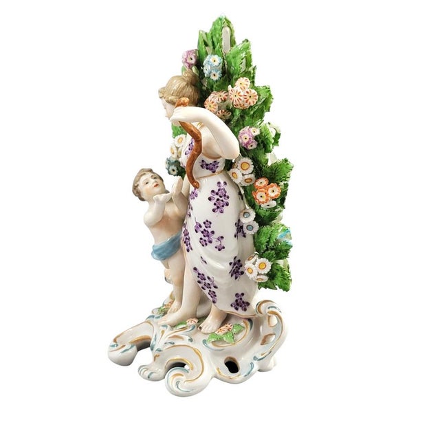 A finely modelled porcelain group of Venus and Cupid in the Chelsea manner, related to models also produced at Derby....