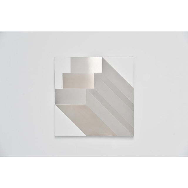 Large abstract modern shaped stainless steel wall artwork designed by Rudolf Wolf and manufactured in his own atelier in...