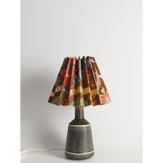 Scandinavian Modern stoneware table lamp by Désirée Stentøj, Denmark, circa 1960s. Handcrafted in glazed stoneware, the...