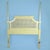A pair of faux bamboo and cane headboards, twin size, with turned bamboo-style frames and airy woven cane panels. Sold as...
