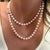 An elegant single strand of glowing Akoya cultured pearls from Mikimoto, this 33-inch necklace features a signature 18K...