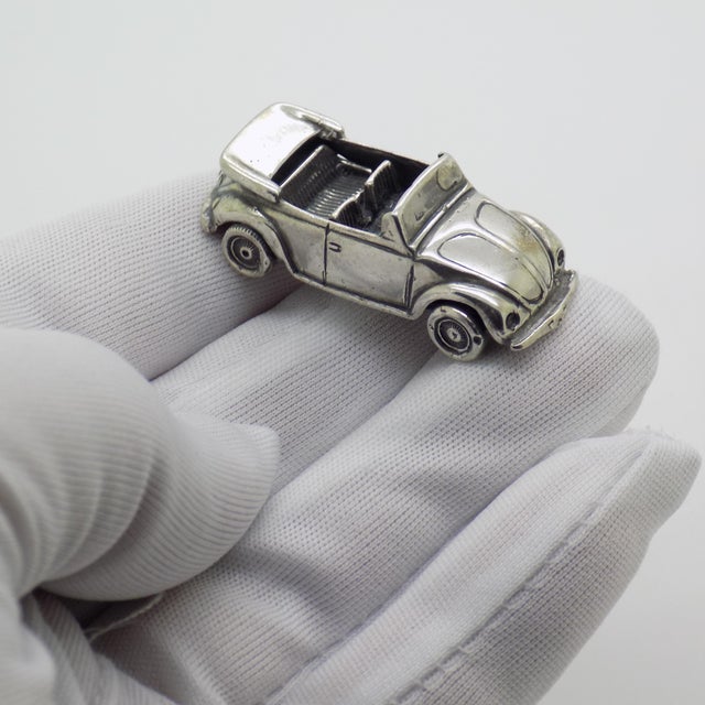 A playful yet refined piece, this vintage Italian miniature captures the timeless appeal of a cabrio convertible car in...