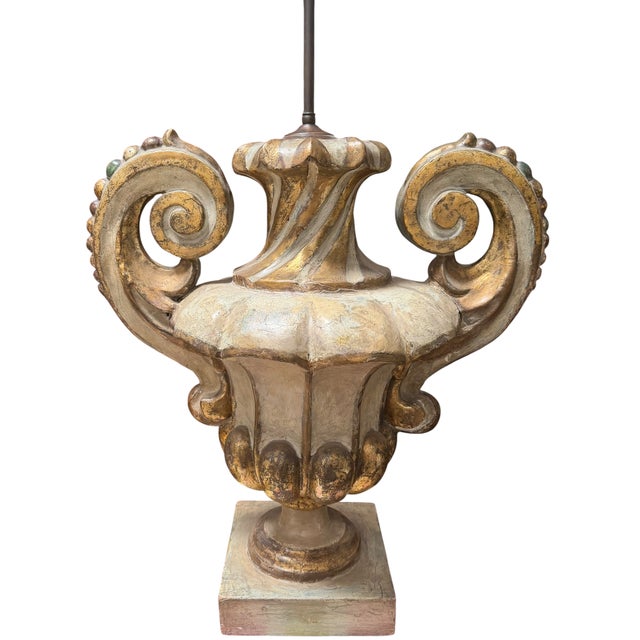 18th-century Italian carved wood urn featuring silver & gold gilding and scroll handles, mounted as a decorative table lamp.