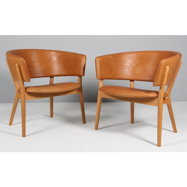 Nanna Ditzel for Snedkergaarden, two seat sofa model ND82, oak, originally upholstered with red Hallingdal from Kvadrat,...