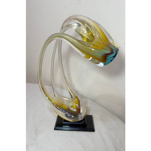 This hand-blown signed studio art glass sculptural stretch vase statue is a unique and artistic piece that would make a...