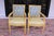 A beautiful pair of Palecek chairs upholstered in a light butter yellow leather with a blue and green fabric seat back. In...