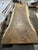 One tree. One top. One of one. A true single-slab live edge table: one continuous cross-section of a single Saman tree...