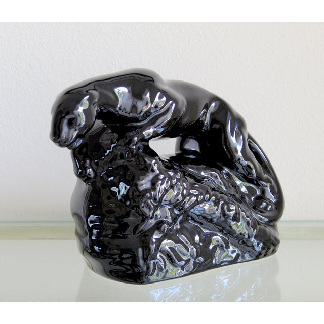 Bring iconic Mid-Century Modern style into your home with this striking vintage black ceramic panther TV lamp sculpture,...