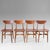 A beautiful and elegant set of four mid-century modern dining chairs, expertly crafted in Scandinavia during the 1960s....
