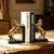 This is a striking pair of sculptural bookends, featuring rearing horses in a dynamic, powerful pose. The horses are...