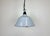 Industrial light grey enamel factory pendant light made in France during the 1960s. White enamel inside the shade. The...