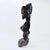 This figure has a strongly defined body and the well-known Songye jutting chin and geometric nose with the eyes...