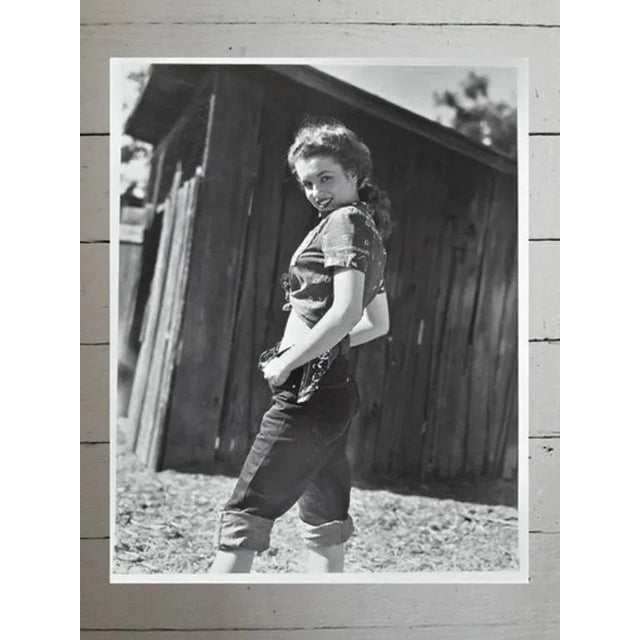 Nice picture of Marilyn, while she was still called Norma Jean Baker. By André de Dienes, the photographer who will reveal...