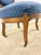 This chair exhibits characteristics of French Regency or Louis XVI style, specifically with its balloon back and cabriole...
