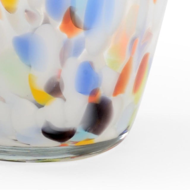 Colorful art glass gives siluro vase a charming yet sophisticated design. This multicolor mouth blown, italian glass vase...