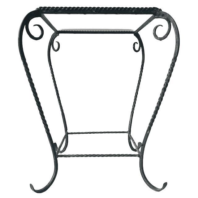 Vintage wrought iron glass plant table side table from the 1960s. Beautiful wrought iron table with a glass top. Also nice...