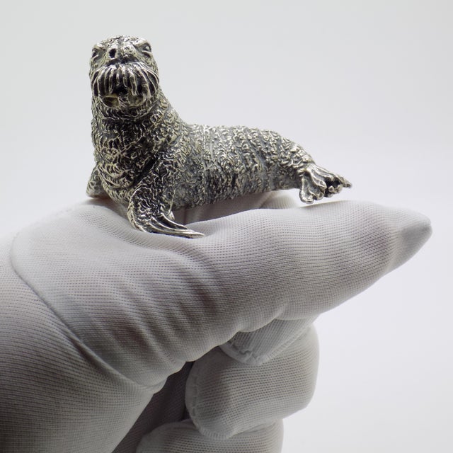 A substantial vintage miniature depicting a walrus, handmade in Arezzo, Tuscany, Italy between the 1960s and 1970s in...