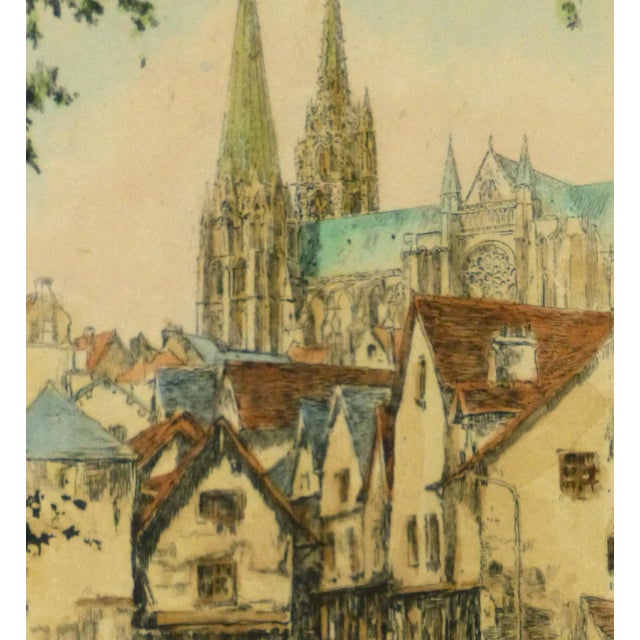 Exquisite aquatint etching exhibiting the charms of the pleasant Rue de la Porte Guillaume with the impressive Chartes...
