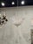 The Murano Clear Granola Glass Leaf Chandelier is a stunning decorative piece that adds elegance and style to any room....