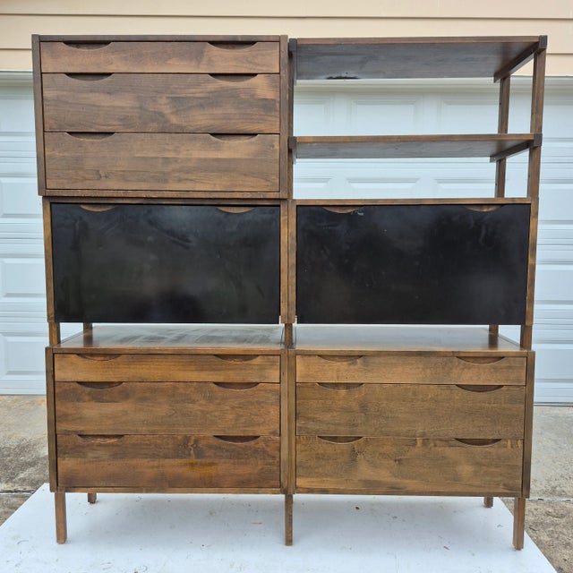 This is a fabulous and rare freestanding modular wall unit by Noral Olson for Kopenhavn. The 2-bay shelving unit offers...