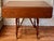 Regency styled bamboo turned convertible drop leaf table. This gem of engineering is a fully functional drop leaf dining...