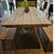 This Rustic Whitewash Dining Set captures a "French Peruvian Romance" aesthetic, blending the rugged textures of...