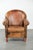 A characterful sheepskin armchair with a beautiful vintage look and a finish with decorative nails. : This is a great...