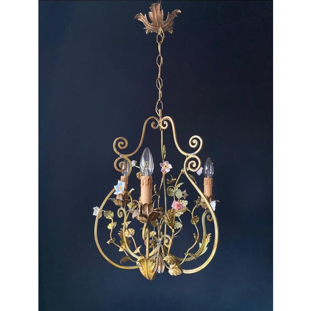 The chandelier is crafted in the florentine style. Material: coated iron – exquisite artistic wrought ironwork. Decorated...