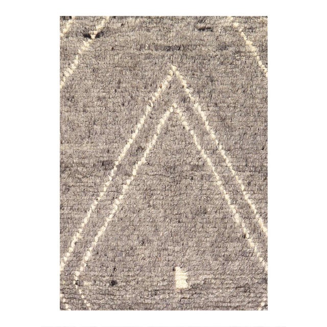 Elevate your decor with the exotic charm of Moroccan rugs. Hand Knotted to perfection, these rugs boast intricate designs...