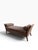 An elegant upholstered chaise daybed by Bright Chair Company, featuring a sophisticated silhouette with dramatically...