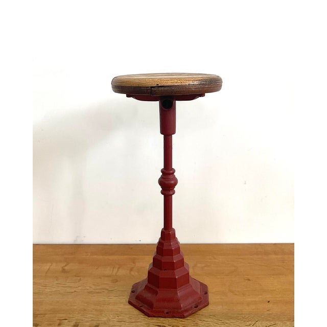 Authentic early 20th century cast iron swivel stool, likely originating from a soda fountain, general store or apothecary...