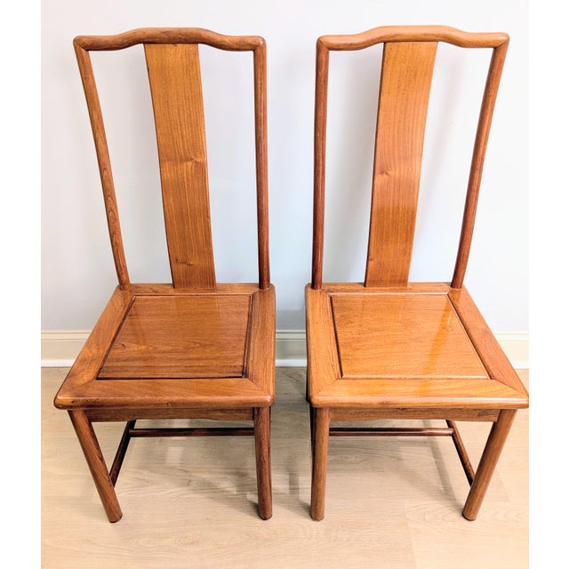 These are two lovely Chinese Ming-style side chairs, with the classic aesthetic, characterized by simple lines, narrow...