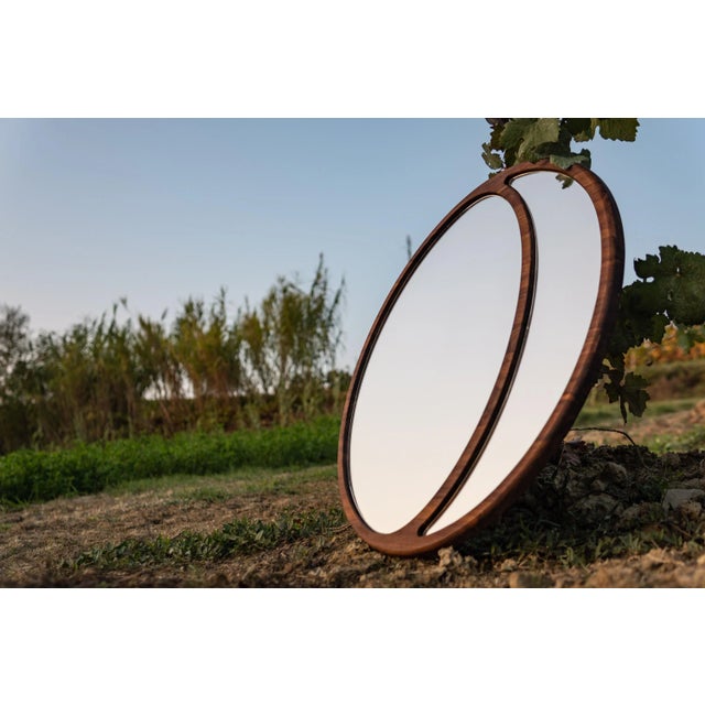 This collection consists of mirrors made of solid wood, which makes the pieces 'alive' and true protagonists of the living...