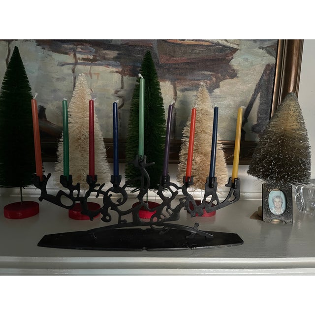 Probably one of my many great Menorah's. Just love this Iron Sculture which works so well with the color candles. It is...