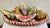 A fabulous mid century hand painted terra cotta centerpiece perfect for your fall decor. This is a large collection, with...
