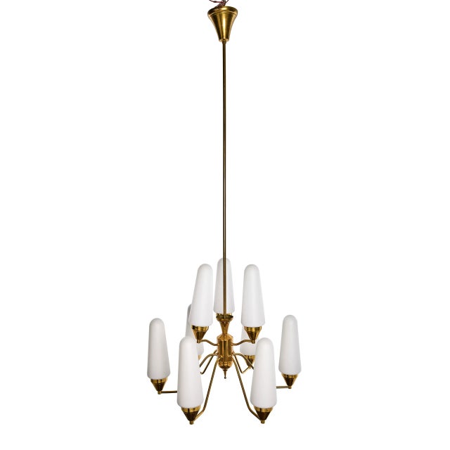 Introduce a touch of mid-century modern elegance to your space with this stunning Scandinavian chandelier. Crafted with a...