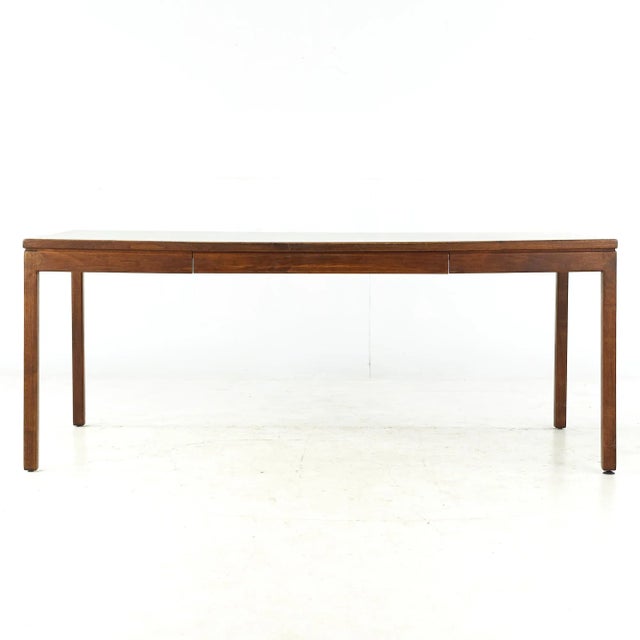 Jens Risom Mid Century Walnut and Formica Top Writing Desk This desk measures: 72 wide x 35.25 deep x 28.5 high, with a...