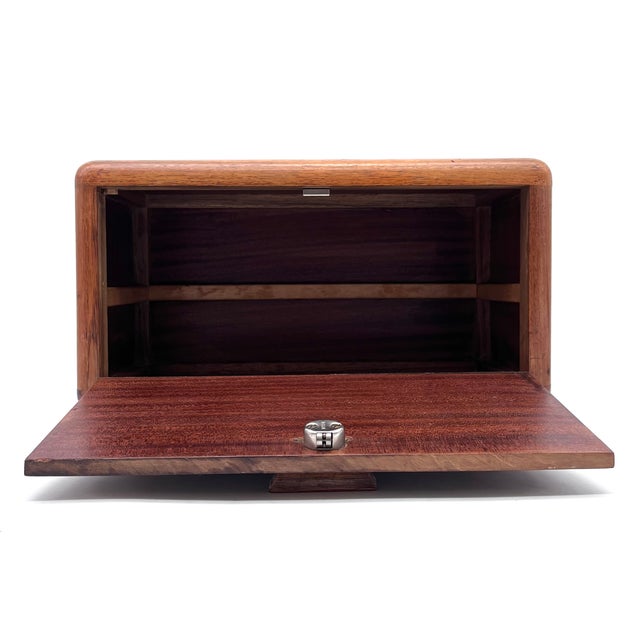 This exceptionally rare piece is an outstanding example of refined interior design from the 1930s. While its form serves...