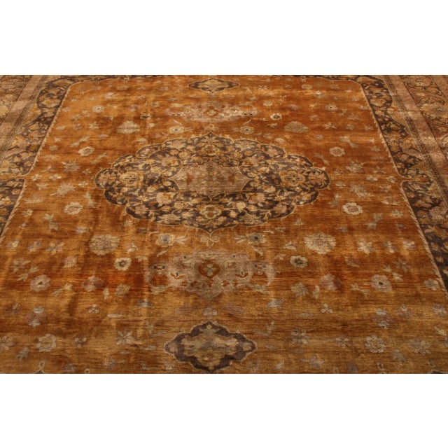 An antique 10x10 Hereke rug from Rug & Kilim’s Antique & Vintage collection. Hand-knotted in wool originating from Turkey...