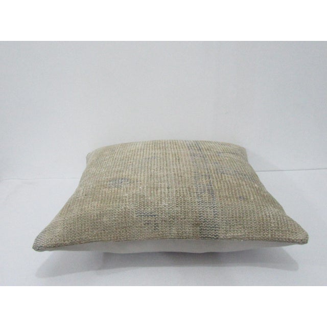 Decorative pillow cover made from a vintage Turkish handknotted rug. Backed with good quality cotton fabric. Pillow...