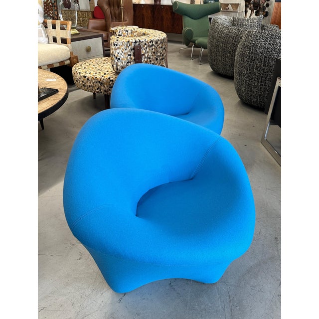A very cool pair of chairs we had redone in a turquoise wool felt. The fabric is soft to the touch, These unusual chairs...